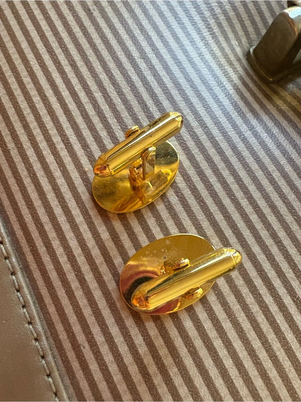 Dior Gold-Tone Oval Brown Enamel Logo Cufflinks